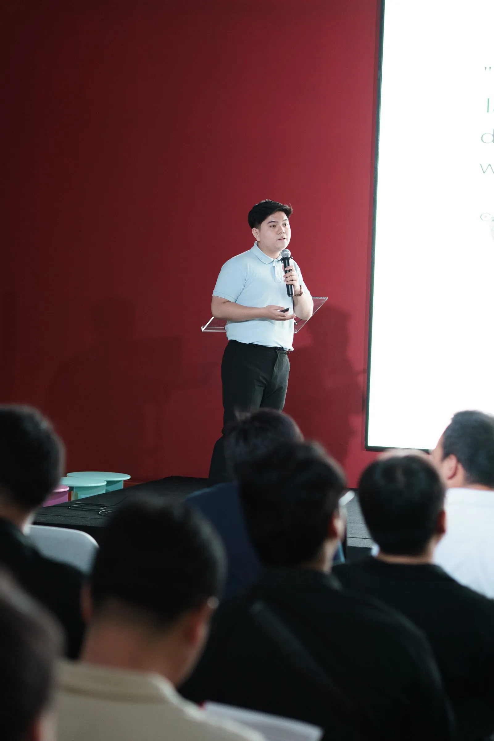 Shaw Nguyen on stage during the LMCache session